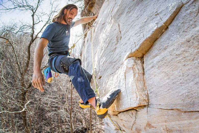 Climbing steep sandstone at the Bachelor Crag in Chattanooga, TN