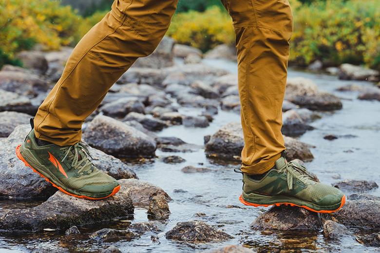 A close up of crossing a stream in the Altra Lone Peak 8 shoe