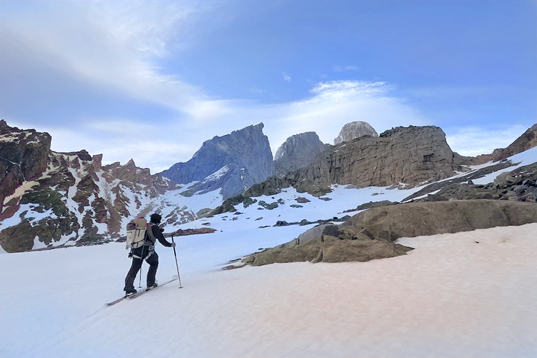A woman backcountry skiing in the mountains of Patagonia.