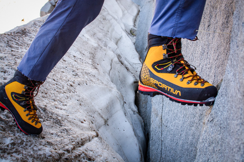 A closeup photo of the La Sportiva Nepal Cube GTX Boots on rocks