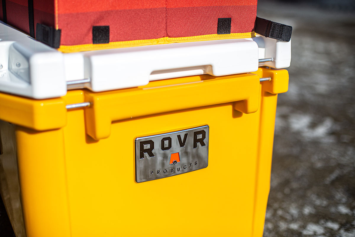 A close up image of a brand name wheeled cooler.