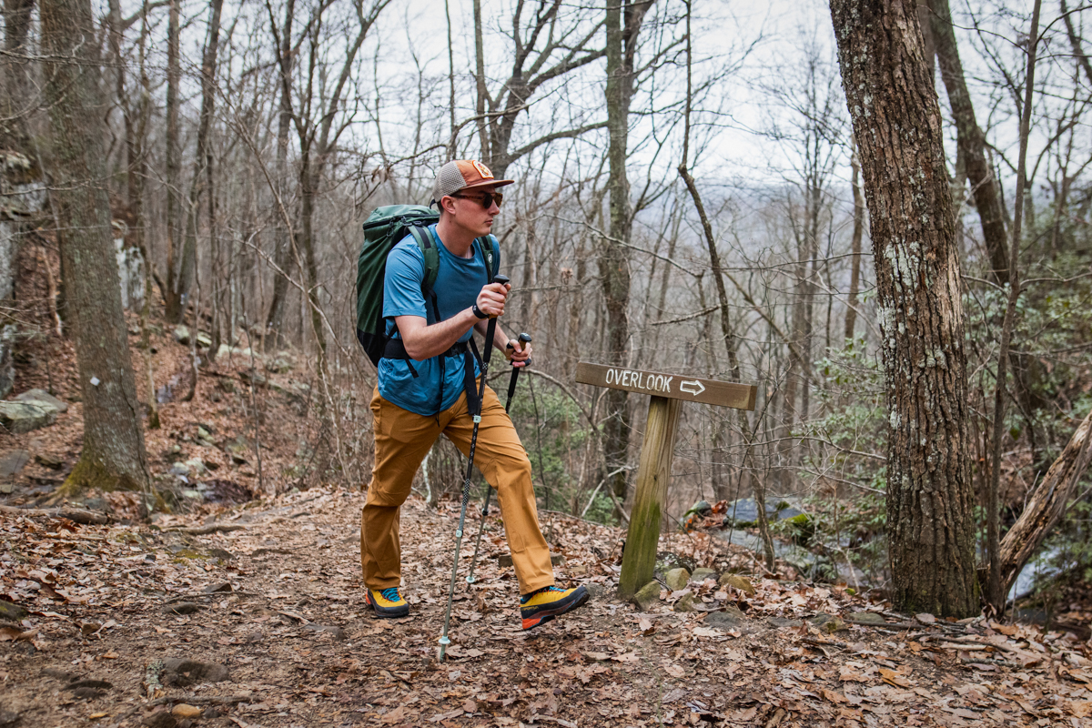 Hiking in approach shoes to a cliffline