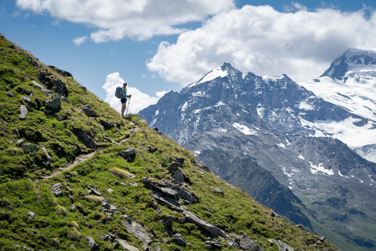 A woman backpacking in Switzerland