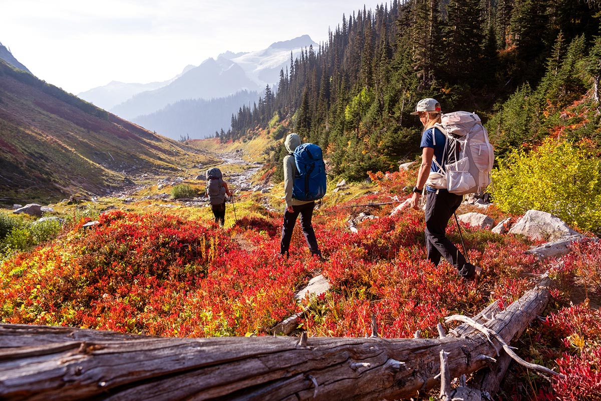 A group hiking in fall colors with hiking shoes
