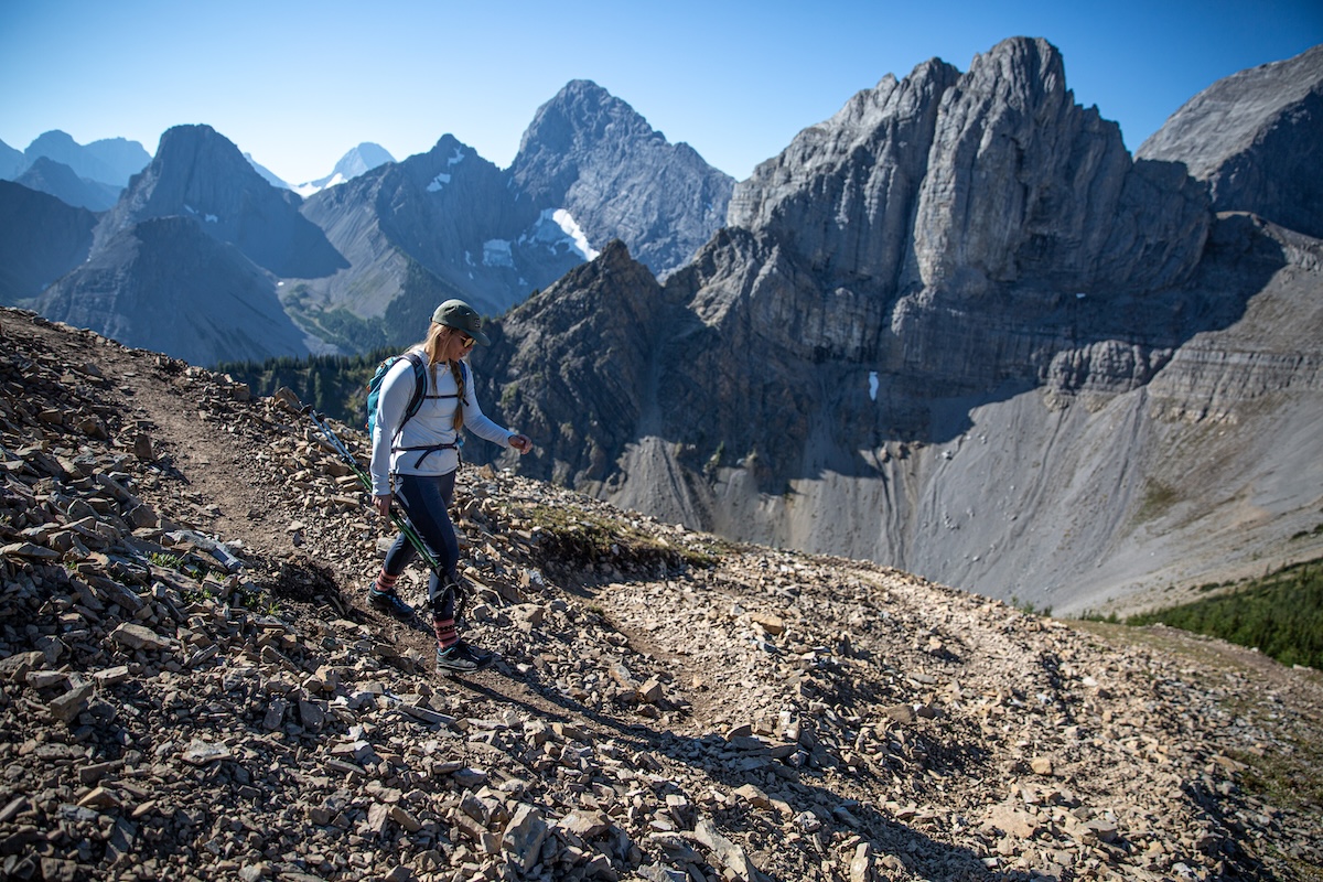 A woman hikes in the Canadian Rockies while testing hiking shoes