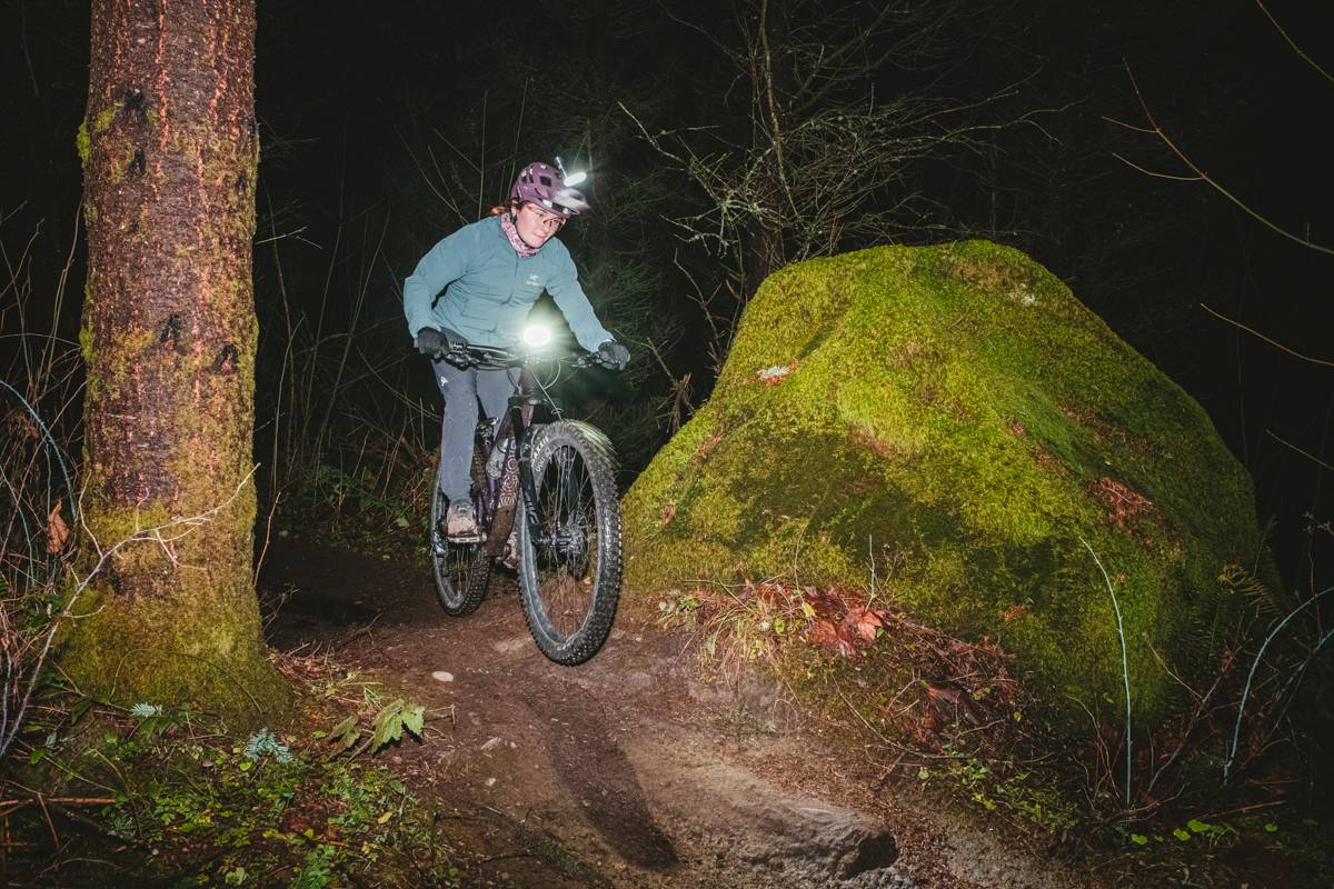 Bike lights (riding past boulder at night)