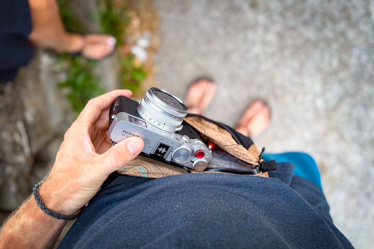 Sliding a Fuji camera into a fanny pack