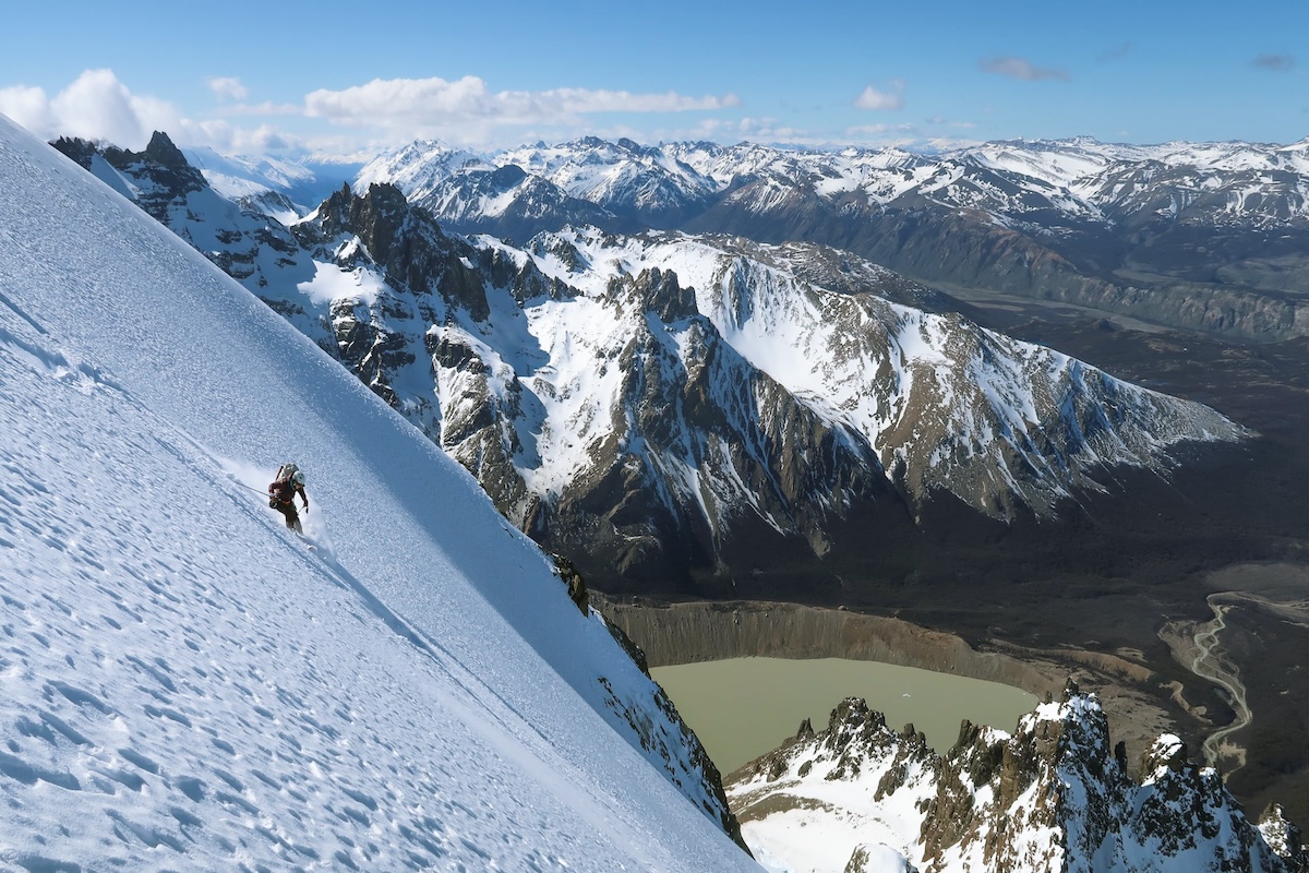 A woman shown skiing in Argentina high above a mountain range