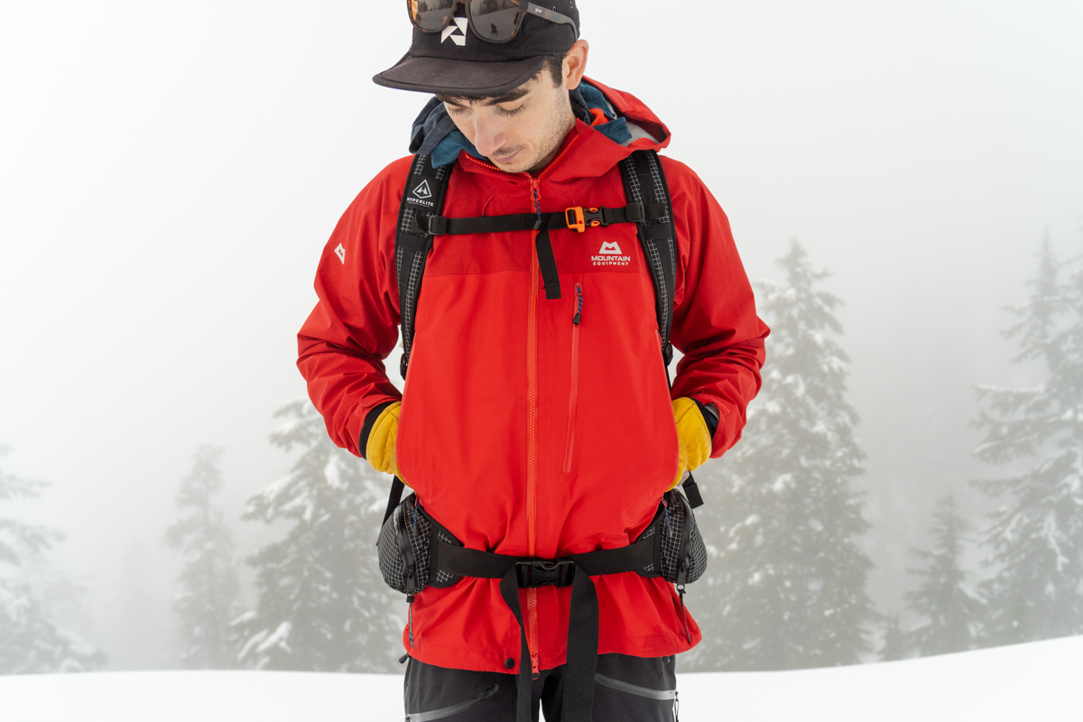 A man stands with his hands in the pockets of the Mountain Equipment Makalu jacket