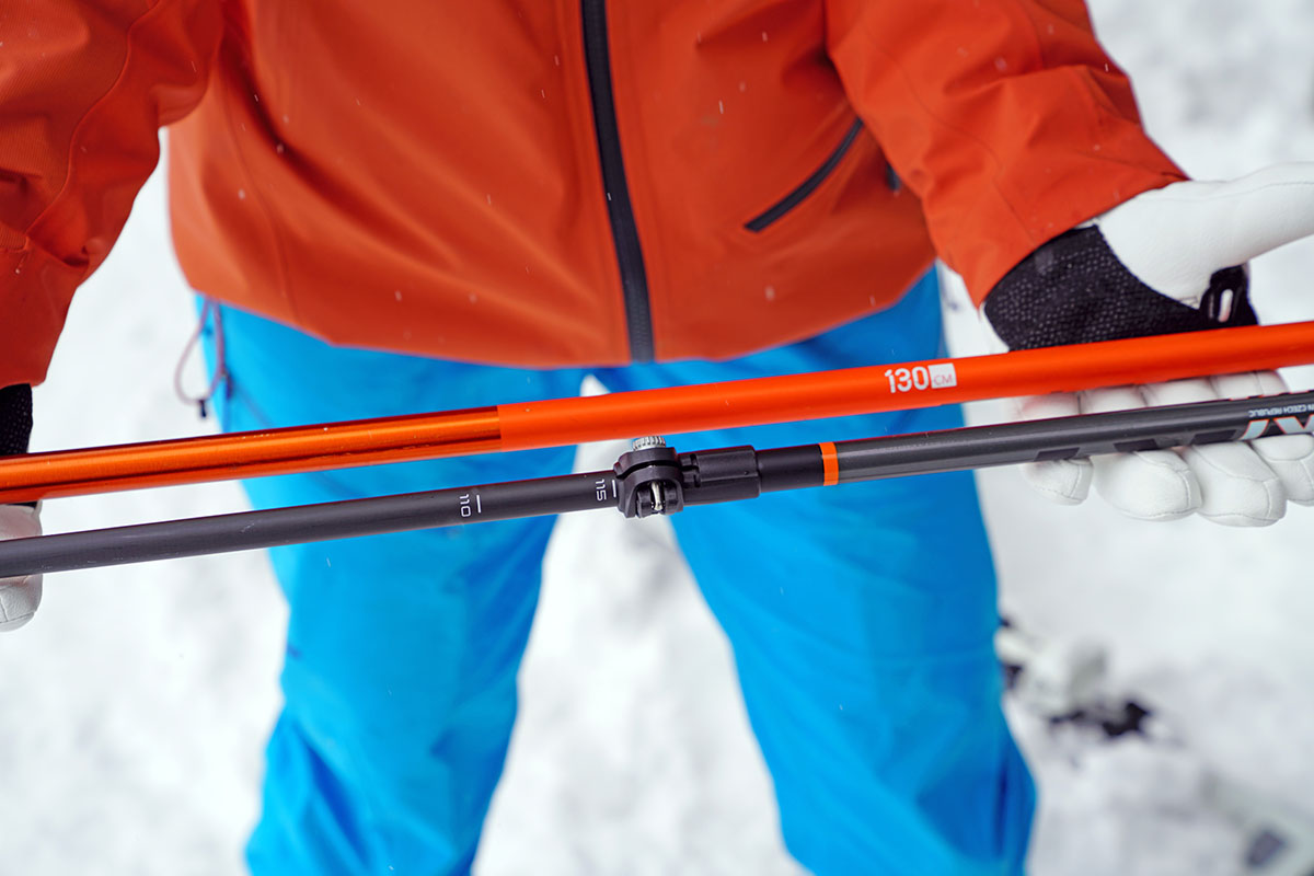The shafts of two ski poles side by side