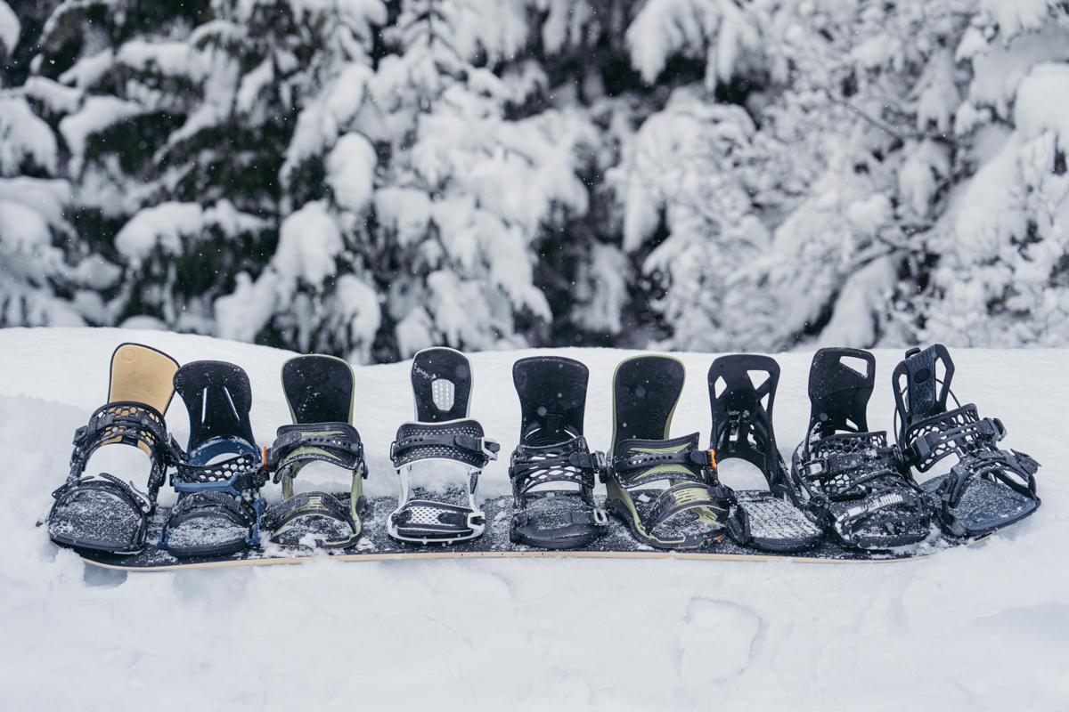 Many different snowboard bindings lined up