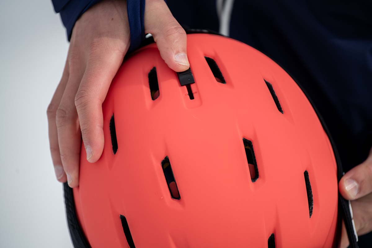 Adjusting the vents on a snowboard helmet
