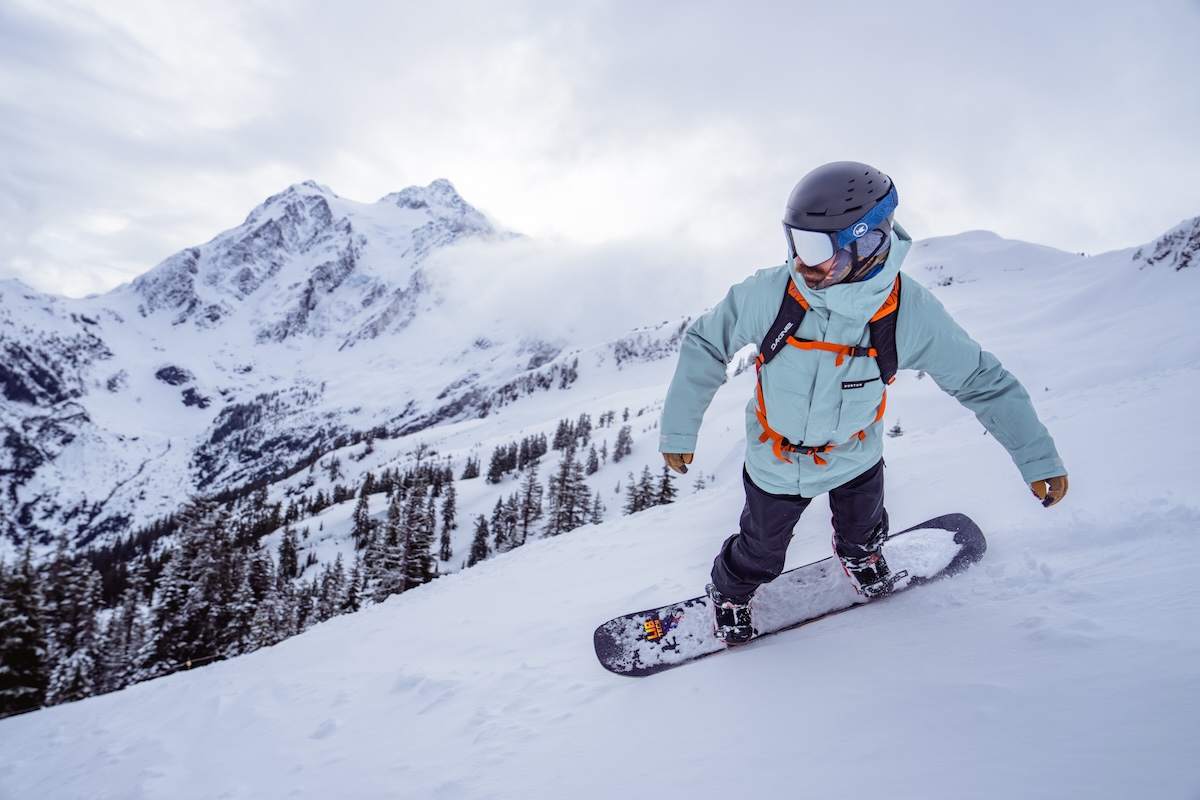 A snowboarder making a turn at Mt. Baker