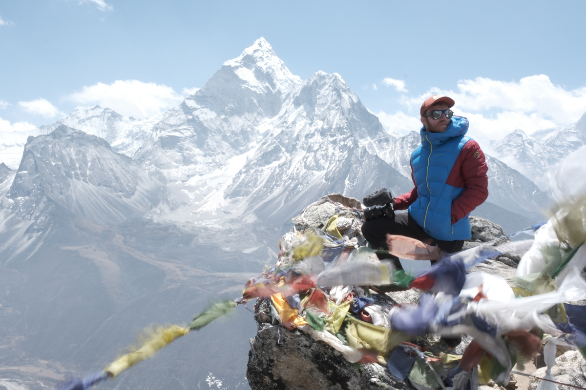 Sports sunglasses (on top of mountain)