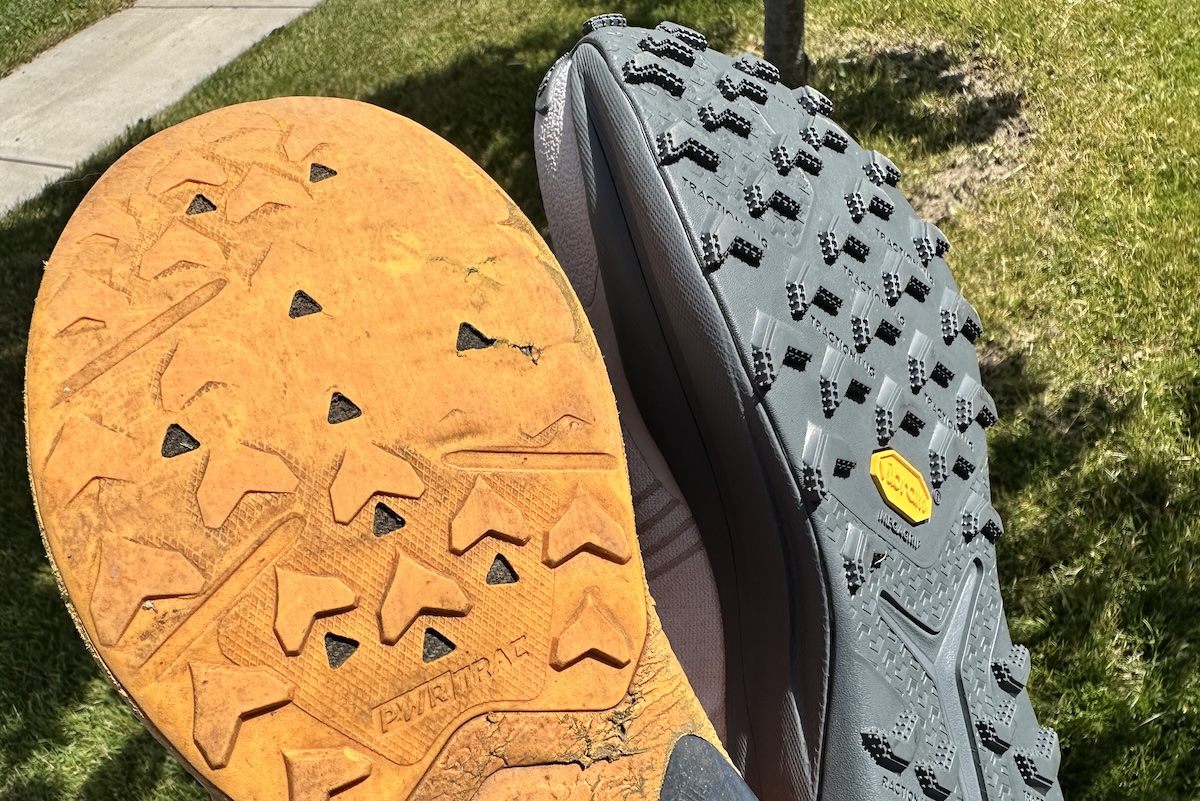 worn out trail running shoe traction shown next to new traction 
