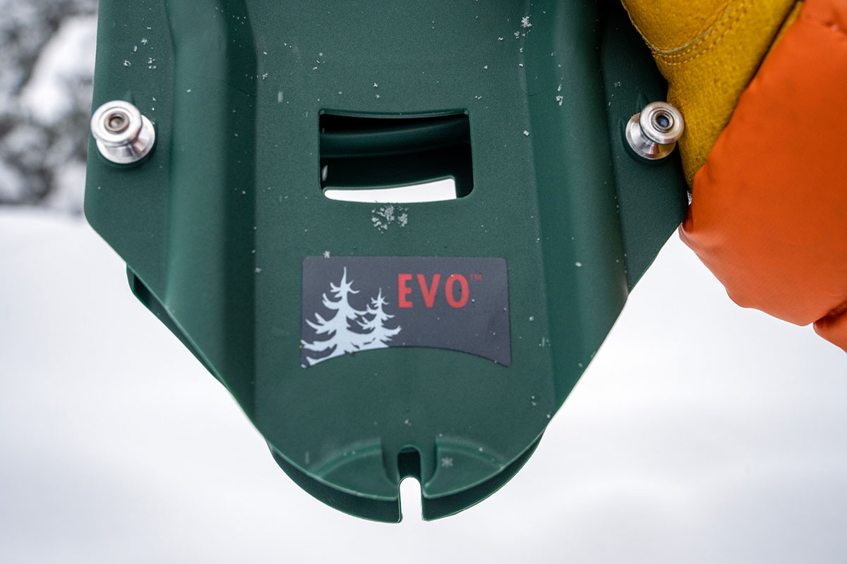 A close up of the plastic decking on a green snowshoe
