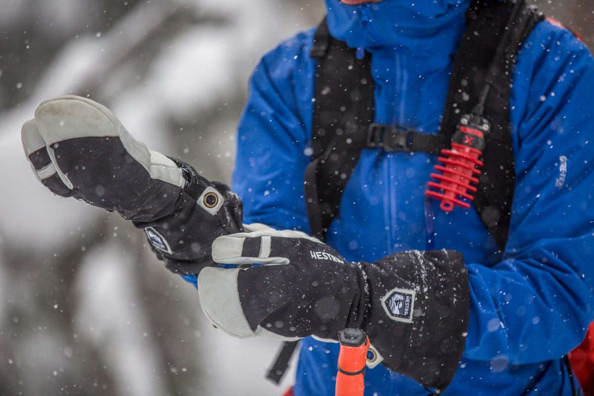 A pair of winter mittens in the snow