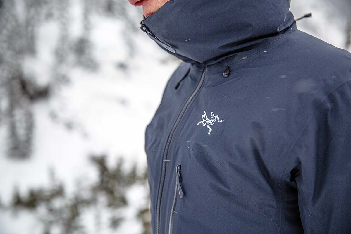 An up close shot of the Arc'teryx Beta Insulated jacket on a wet and snowy day