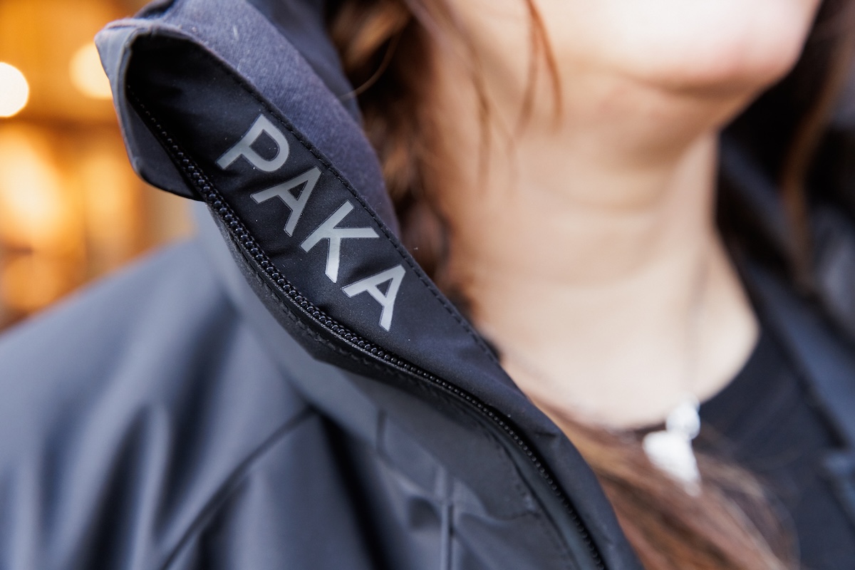 A close up of the Paka logo on the collar of the Apu Parka