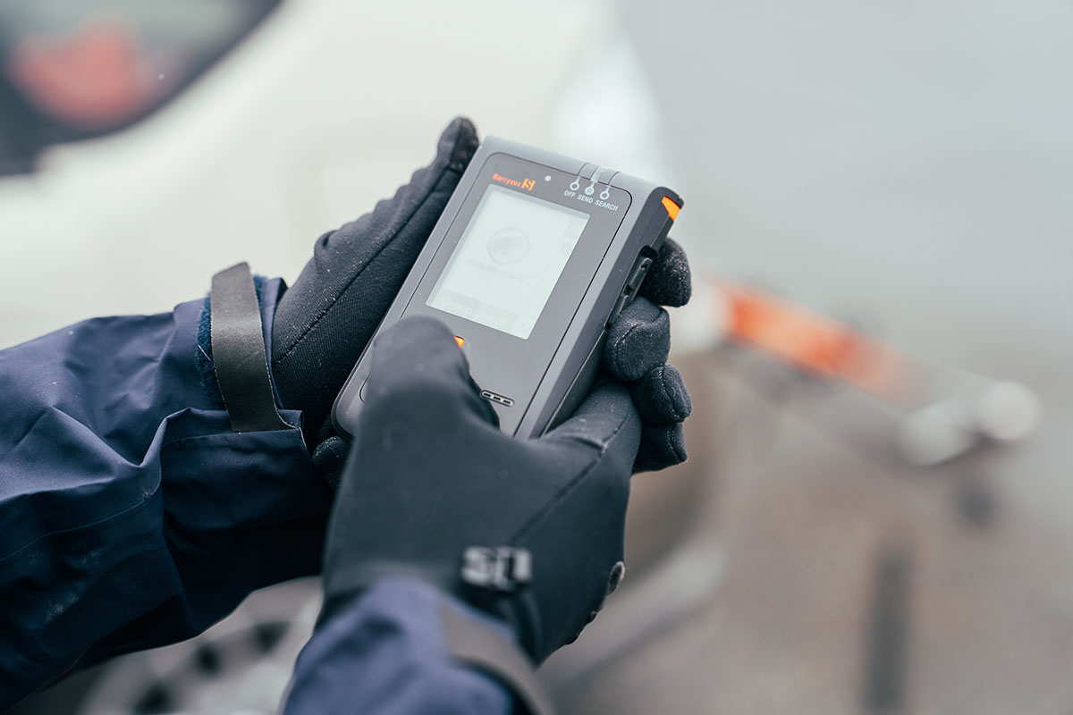 A close up of an avalanche beacon