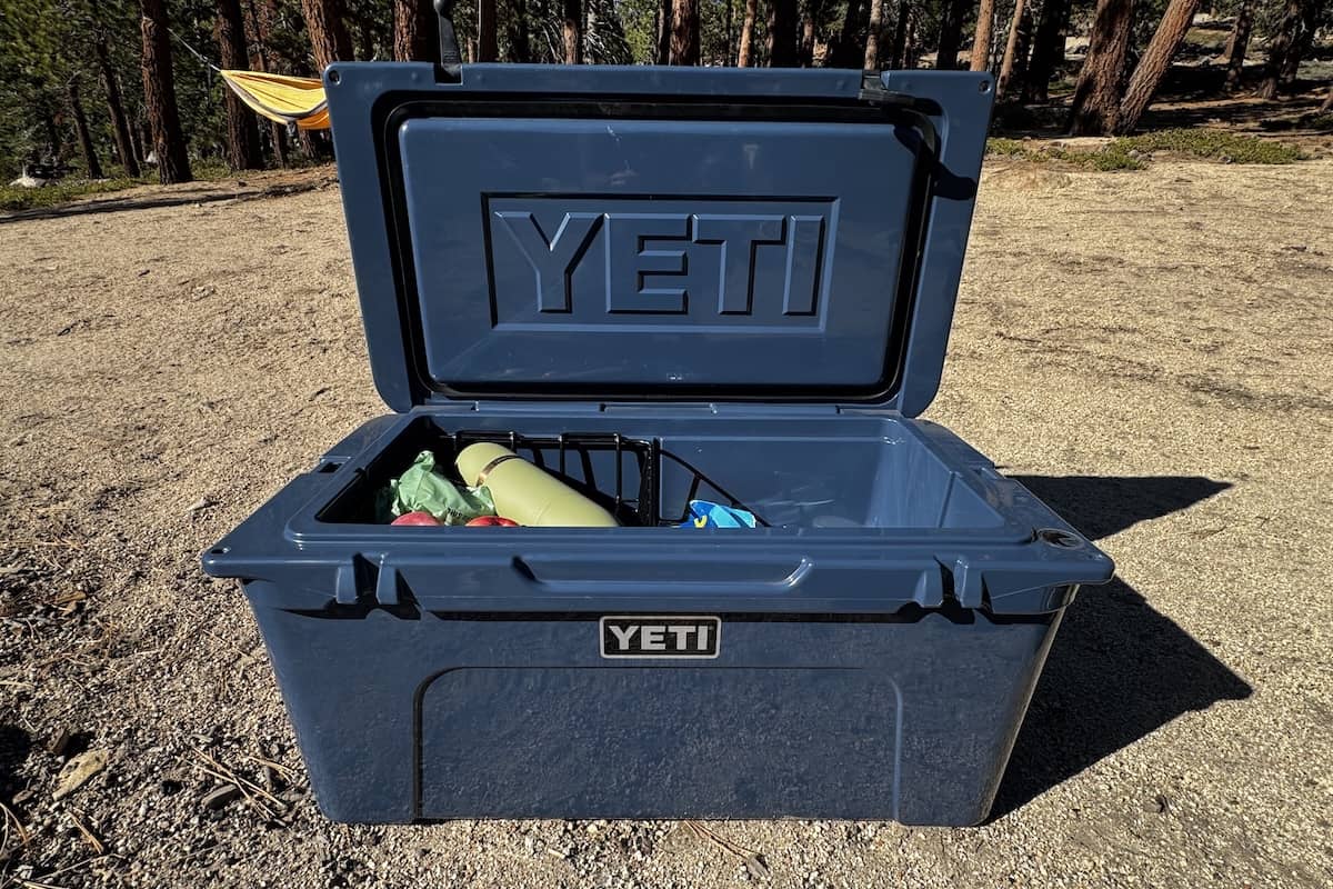 A blue cooler with the lid open