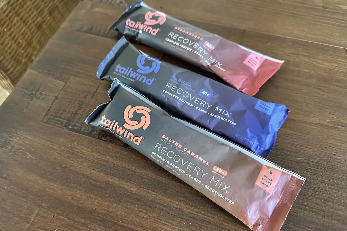 tailwind nutrition recovery shake packets are lying on a table