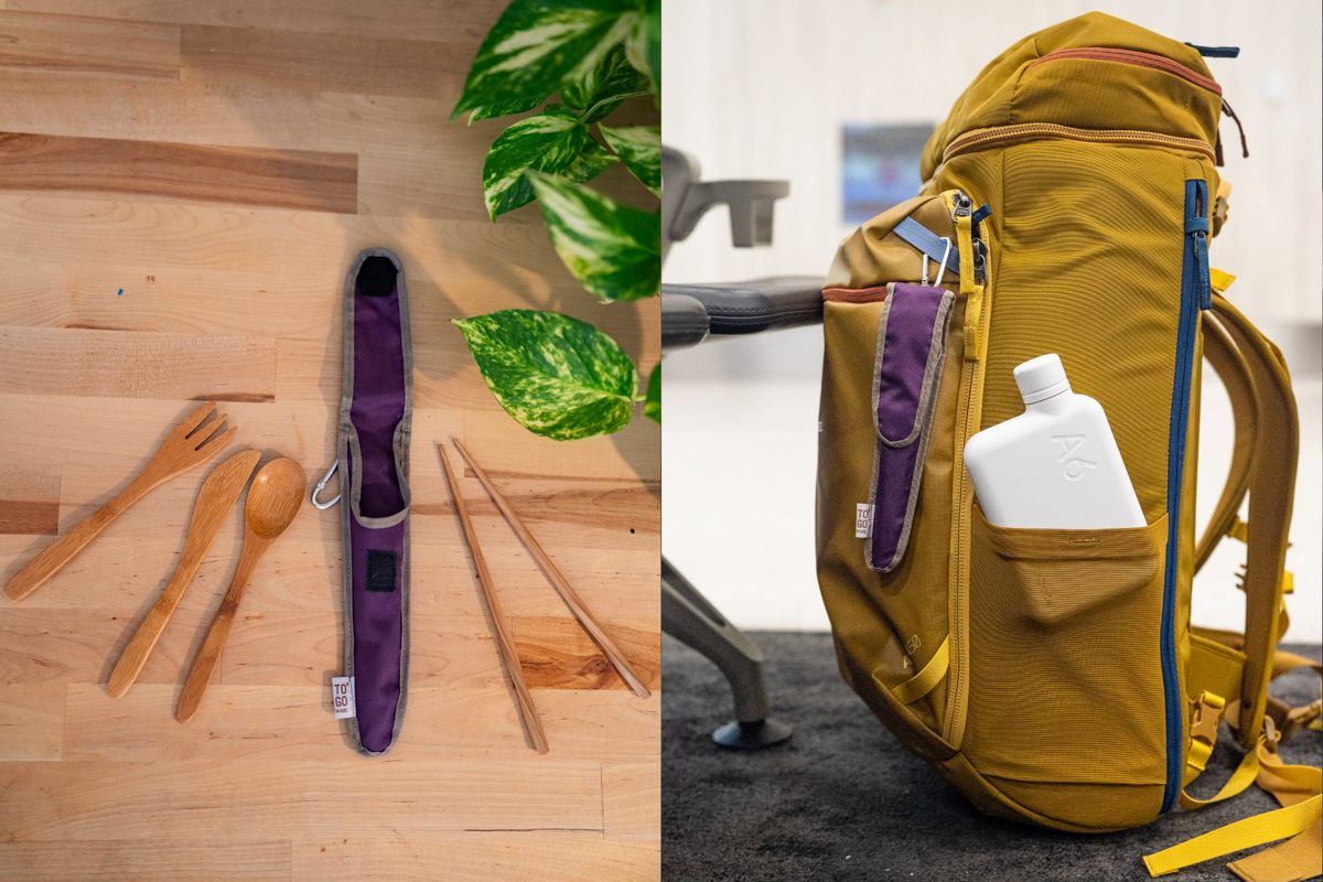 A bamboo fork, knife, spoon, and chopsticks are laid out on a table with a slim travel sleeve,