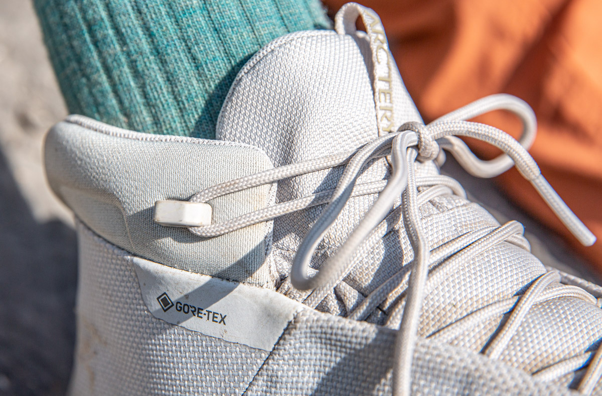 A close up of the mesh upper on a pair of white hiking boots