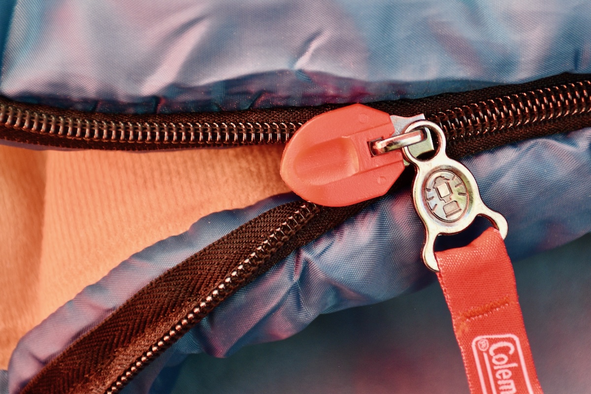 Showing the anti-snag zipper on the Coleman Brazos 20 Sleeping Bag 