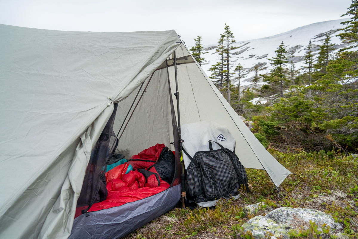 A backpack in the vestibule of a backpacking tent