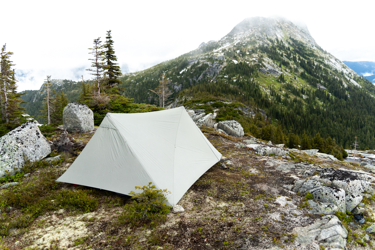 A backpacking tent pitched on a ridgeline
