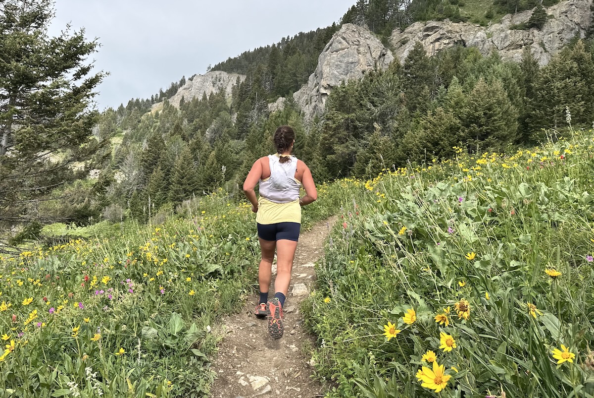 maggie slepian running uphill in the Hoka speedgoat 2 