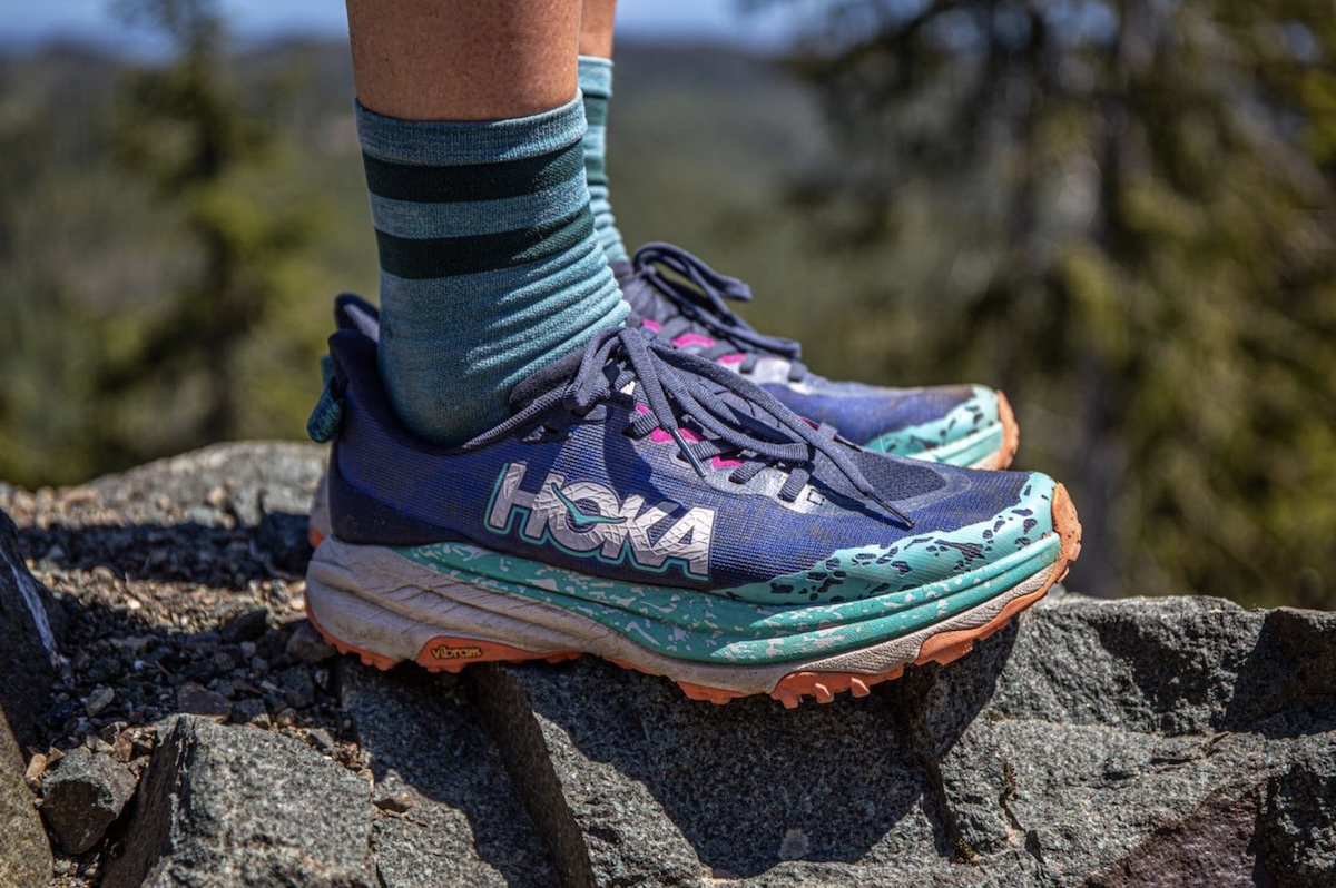Hoka Speedgoat 6 - side view on a rock 