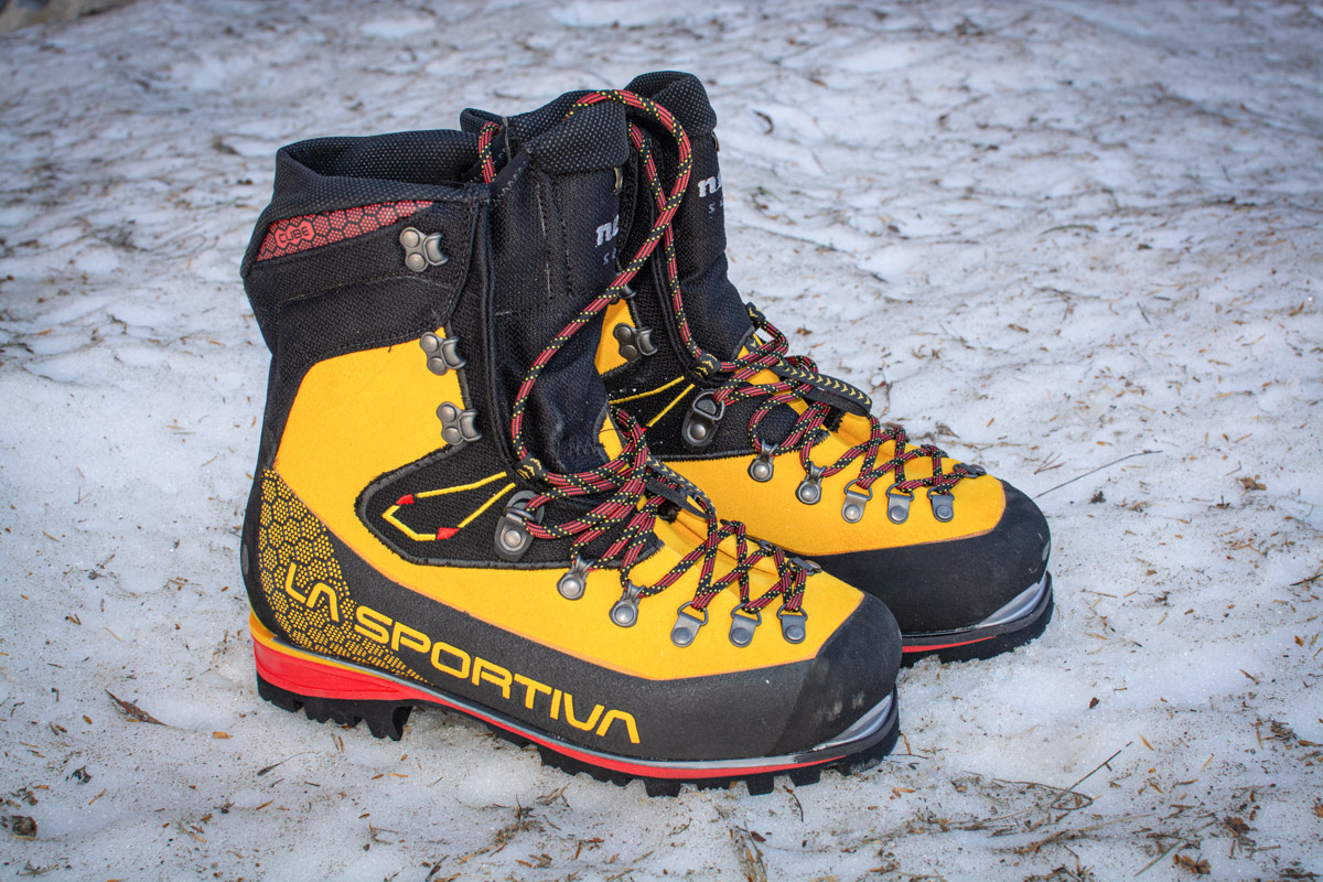 A close up shot of the La Sportiva Nepal Cube GTX boots on the snow