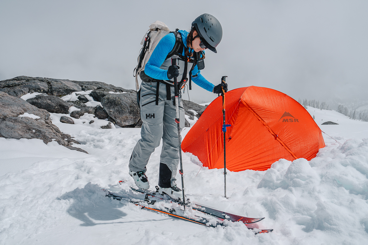 MSR Access 2 (putting on skis outside of tent)