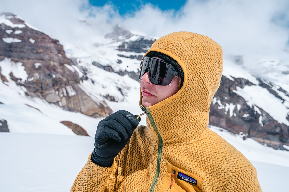 Zipping the hood up all the way on a fleece jacket