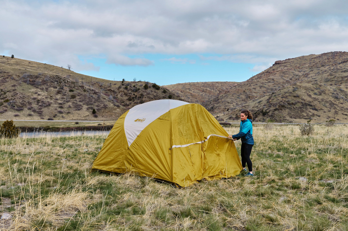 REI Co-op Base Camp 6 (putting on rain fly)