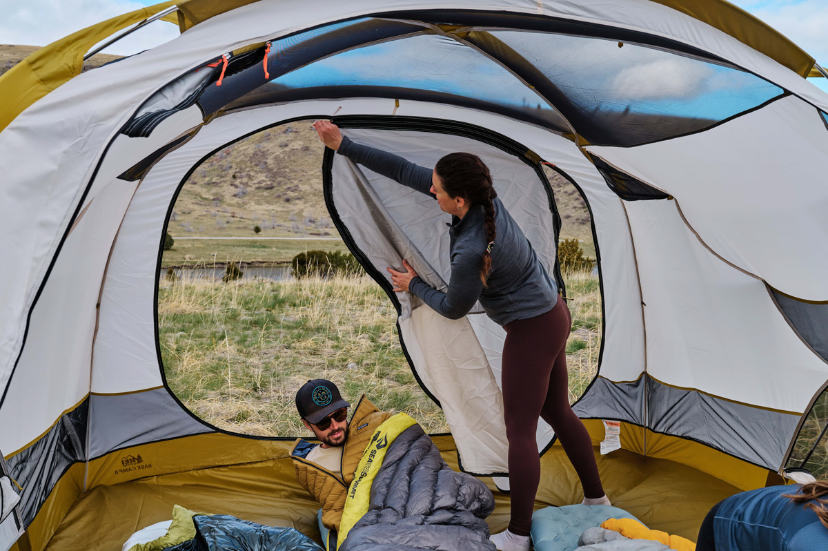 REI Co-op Base Camp 6 (zipping up door)