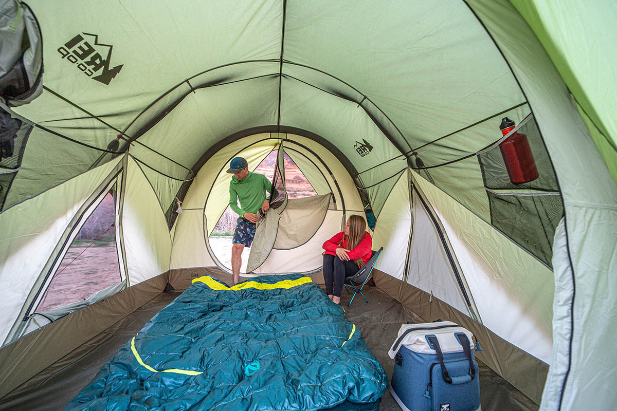 A couple takes a break inside their Wonderland tent.