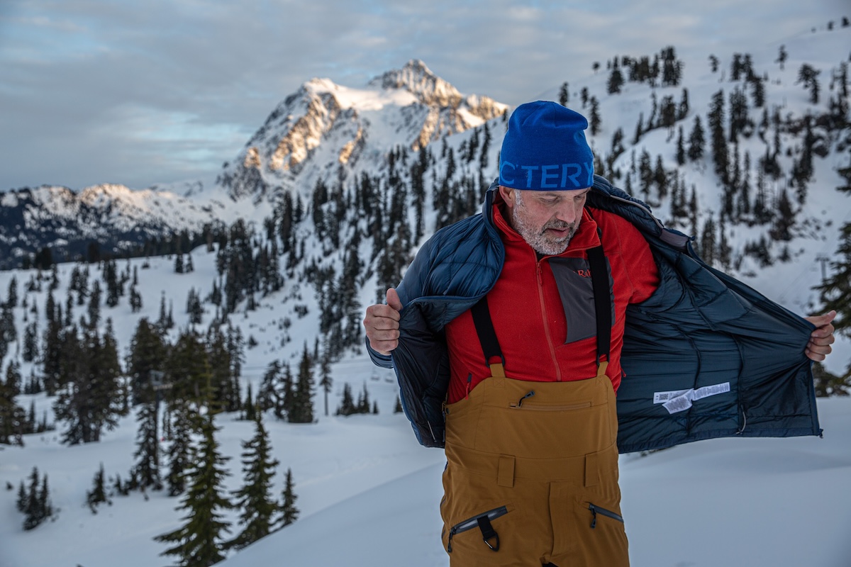 Putting on the Rab Muthic Alpine jacket