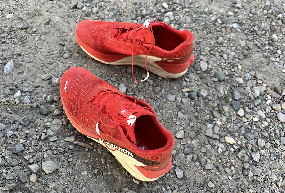 salomon shoes on the ground 