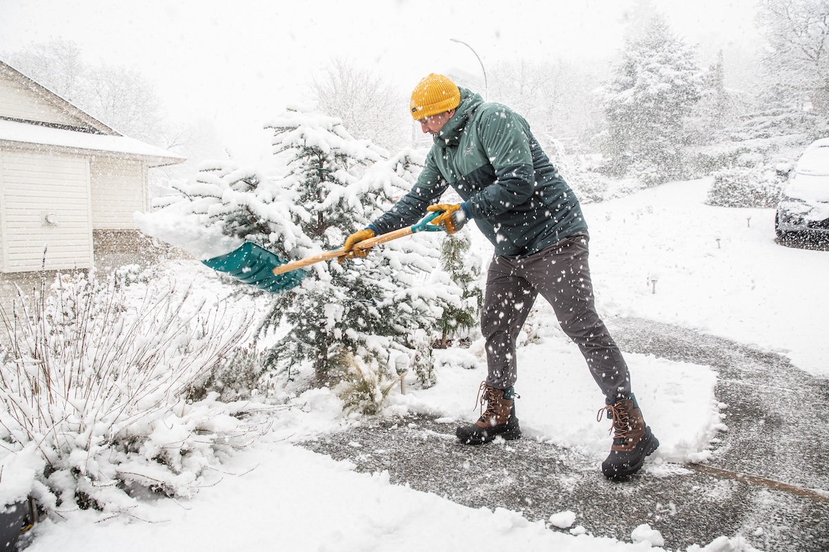 Shoveling in a storm in the TNF Chilkat
