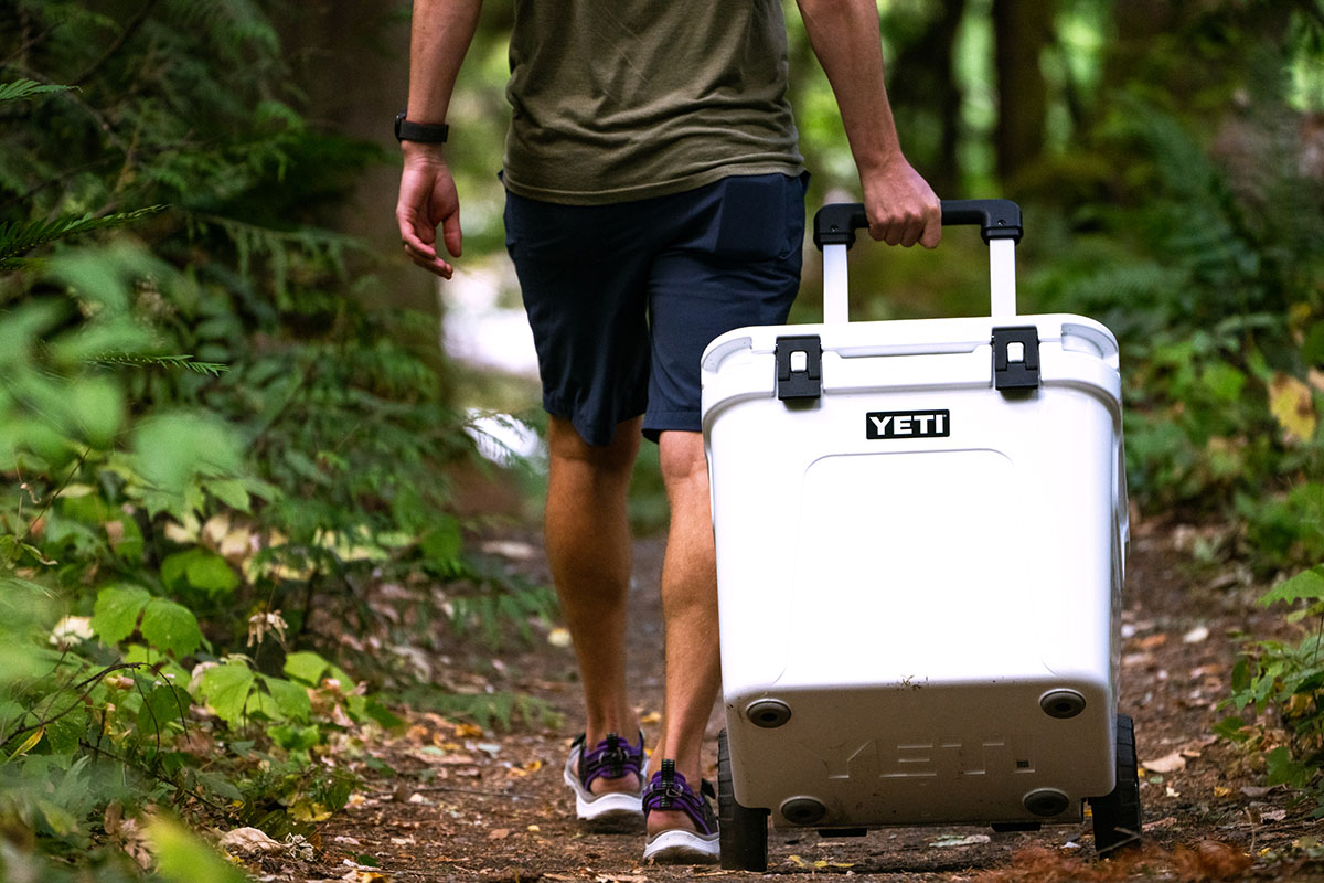 REI Member Moment Sale (towing Yeti Roadie 48 wheeled cooler on trail)