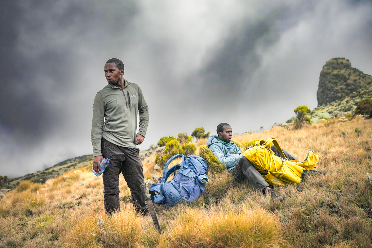 Paul and Marting rest on our climb up to Kinangop