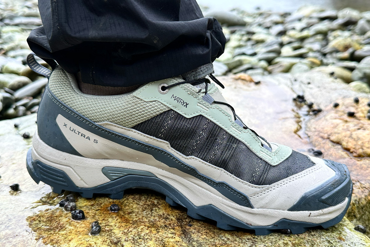 Close up of green and brown Salomon hiking shoe