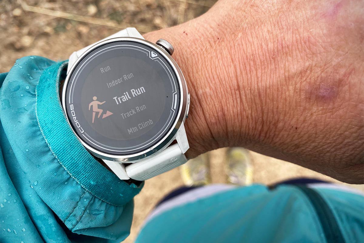 A closeup of the Coros Apex GPS watch screen on a wrist