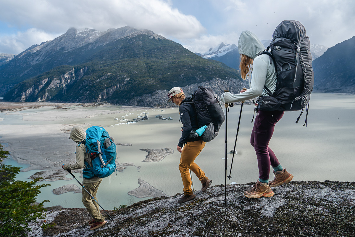 The Switchback Travel hiking down a steep rock in Chilean Patagonia